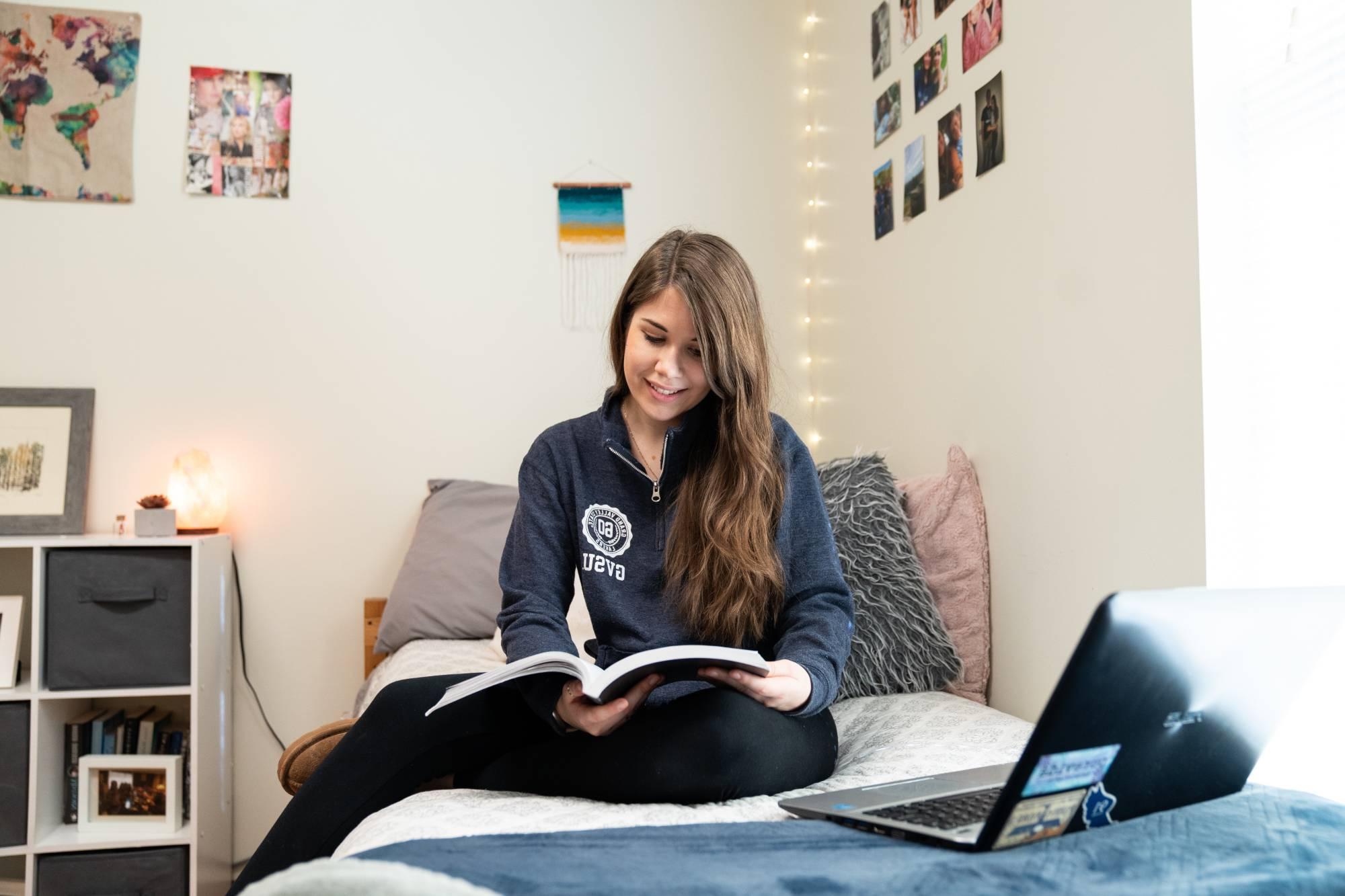 Image of student in a secchia hall room